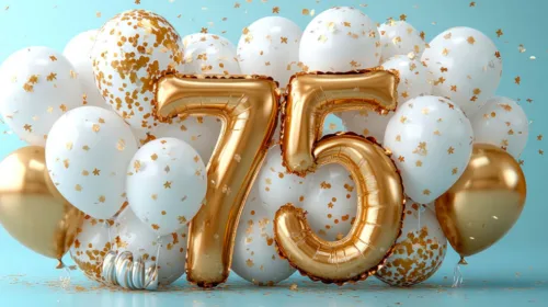 Luftballons umrahmen die Szene, während in der Mitte die Zahl 75 aus Luftballons geformt ist.